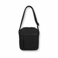 Front view of the Bugatti Madison black vegan leather crossbody bag for travel on a white background.