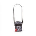 A high-resolution hero shot of the leopard print mobile crossbody case with the Rolling Stones logo charm.